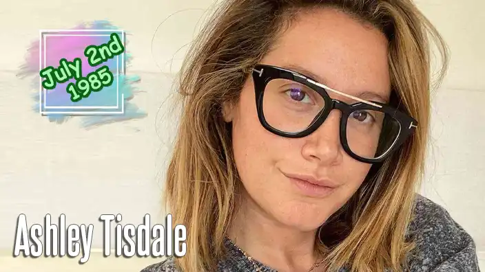 Ashley Tisdale smiles during a public appearance, celebrating the actress, singer, and producer who became one of Disney Channel's most recognizable stars.