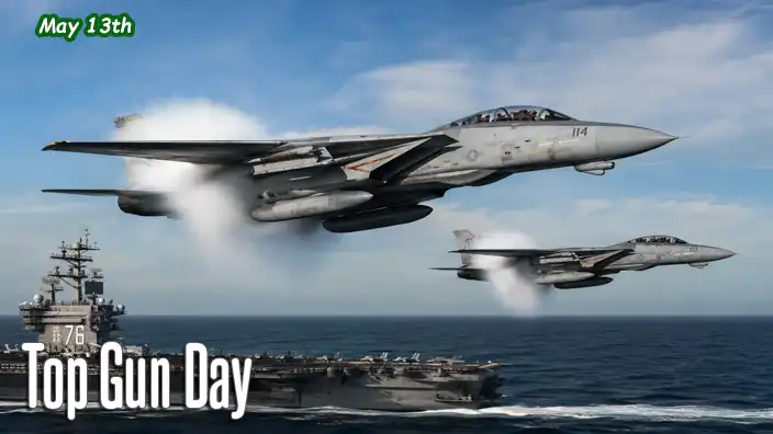 An aircraft carrier sails across a calm sea as two F-14 Tomcat fighter jets roar overhead in tight formation, leaving dramatic condensation clouds behind them. The wide-angle scene highlights the speed, skill, and iconic presence of naval aviation against a clear coastal sky.