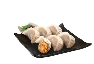 Dumplins on a dark plate with a transparent background